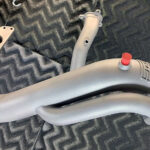 GrimmSpeed Hi-Flow Exhaust Manifold - Cerakote Glacier Titanium